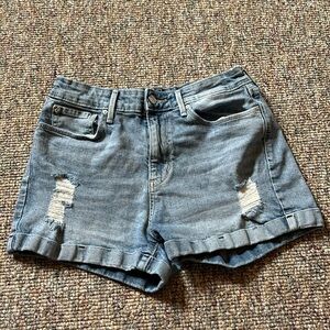 Ripped “mom jean” shorts
